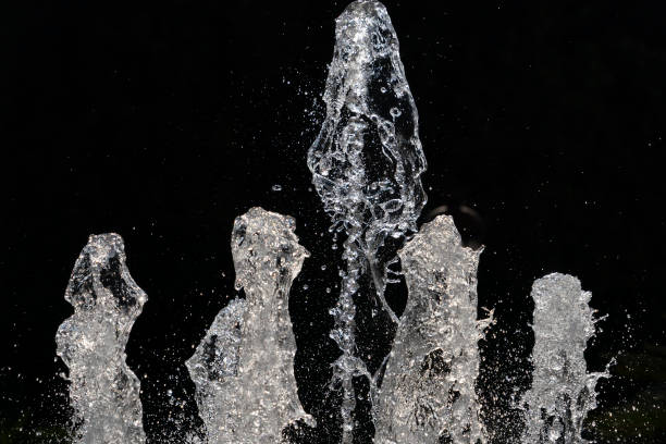 istock fountain splash water detail close up 1190408285