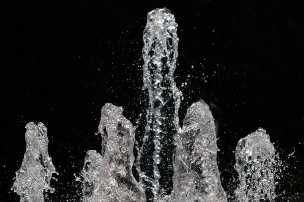 istock fountain splash water detail close up 1190408324