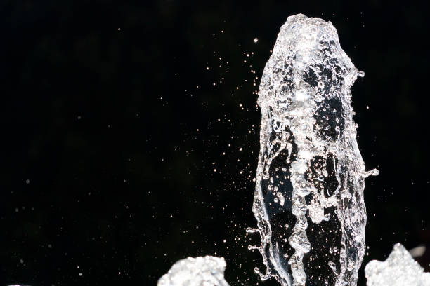 istock fountain splash water detail close up 1190408393