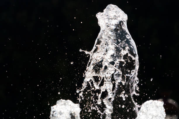 istock fountain splash water detail close up 1190408429
