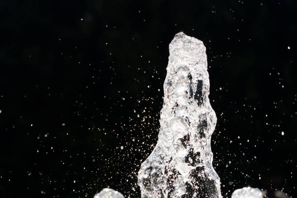 istock fountain splash water detail close up 1190408454