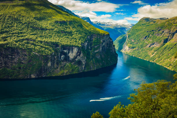 istock Fjord Geirangerfjord with ferry boat, Norway. 1190409221
