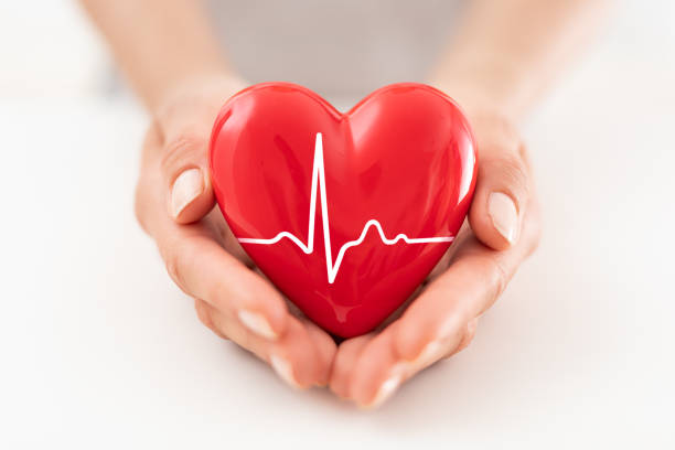 istock The woman is holding a red heart. 1190411277