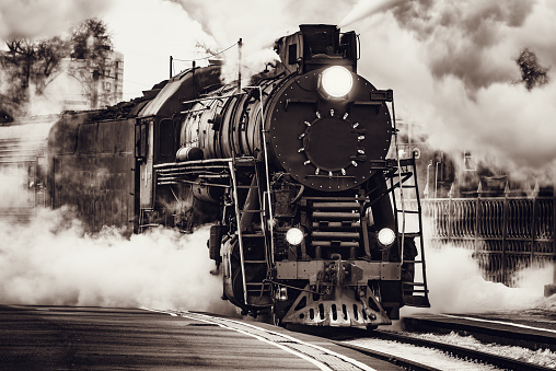 Steam train departs from Riga railway station. Moscow. Russia.