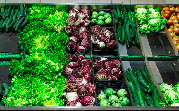istock Vegetables on shelf in supermarket. 1190415248