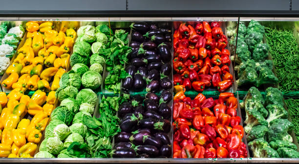 istock Vegetables on shelf in supermarket. 1190415348
