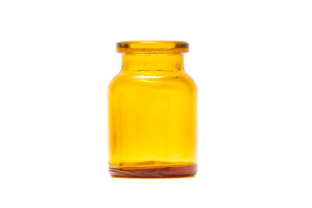 istock Small glass jars isolated on white background 1190417356