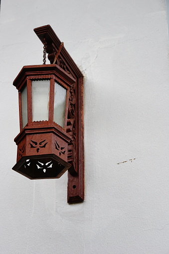 Wall lamp on day