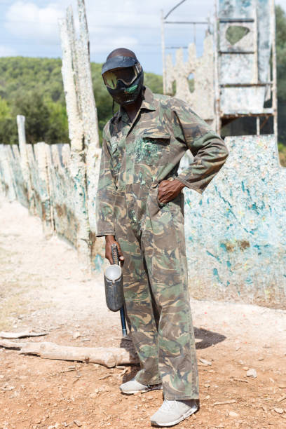 istock Paintball player after match outdoors 1190417803
