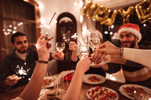 istock people have fun at dinner for christmas 1190420730