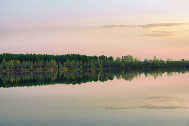 istock Large lake or river in good Sunny calm weather 1190420876