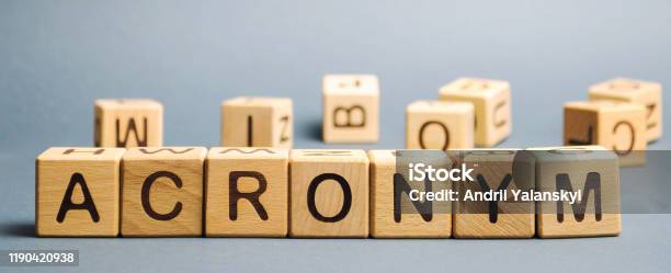 Wooden Blocks With The Word Acronym Abbreviation From The Initial Components Of A Phrase Or A Word Stock Photo - Download Image Now