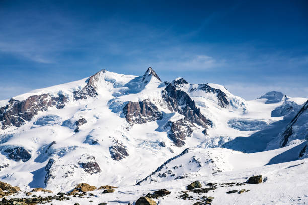 Switzerland highest peak Dufourspitze 4,634 m, Monte Rosa, above Zermatt town in Mattertal, Valais canton, Switzerland, in winter. Taken by Sony a7R II, 42 Mpix.