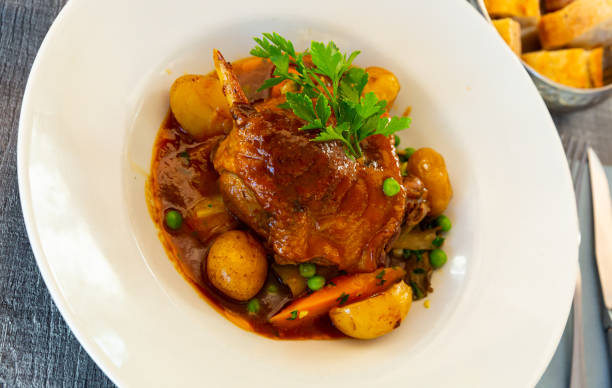 istock Braised duck leg with vegetables 1190423307