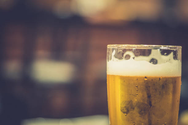 istock Cold craft beer in a glass with water drops, close up 1190423330