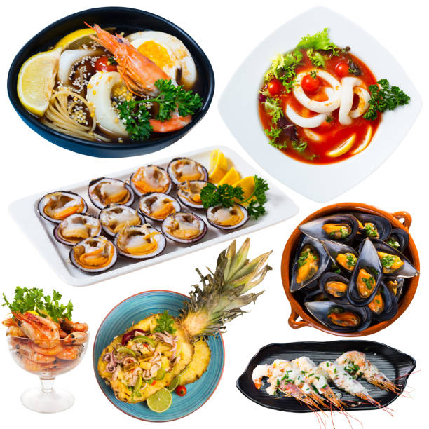 istock Dishes with different  seafood at plates isolated on white background 1190423923