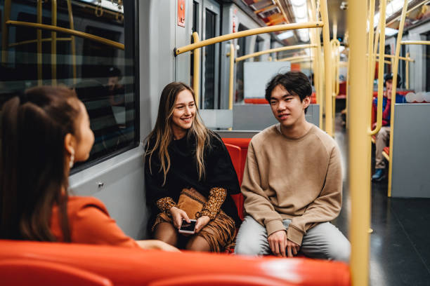 Teenagers in subway train