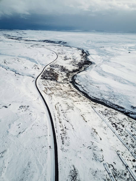 istock winding road in iceland aerial view 1190424404
