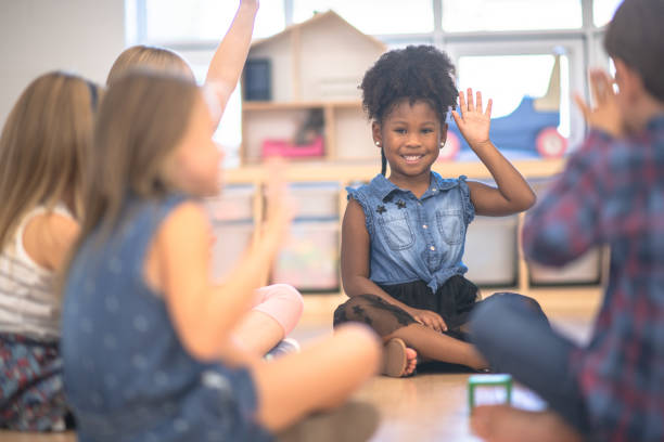 istock Kindergarten Class Asking Questions During Circle Time stock photo 1190425030