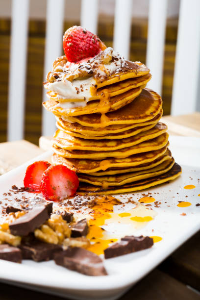 istock Pumpkin pancakes with sauce 1190425090