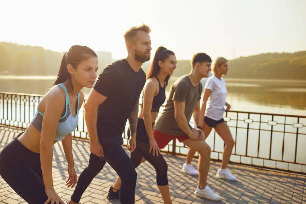 istock A group of athletes running in the park. 1190425721
