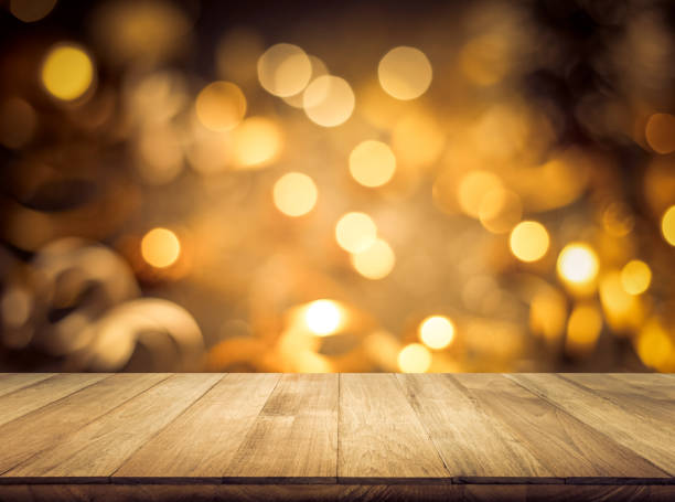istock Wood texture table top (counter bar) with blur light gold bokeh in cafe,restaurant background 1190425961