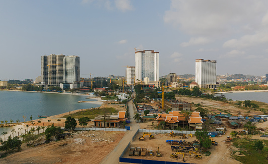 Skyscrapers and hotels construction an Chinese investment in Cambodia by the sea