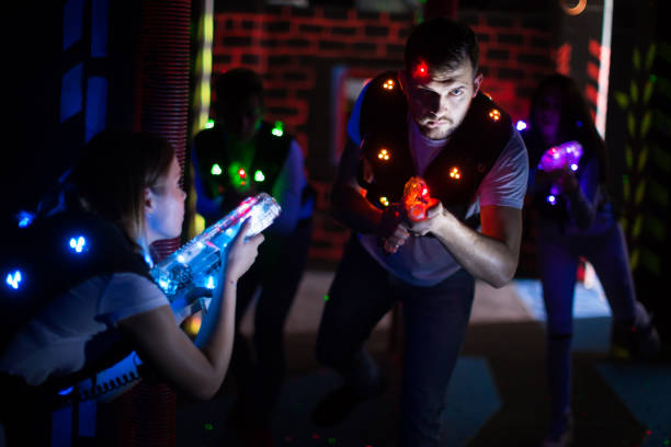 istock Young man on laser tag arena 1190430779