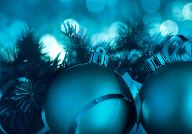 istock Christmas ball decorations with fir tree on blue background 1190431788