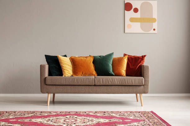 istock Vintage style grey living room interior with trendy sofa 1190432174