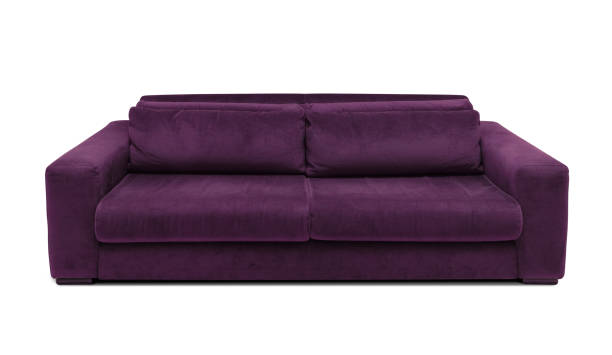 istock Modern dark purple sofa. Minimalistic couch isolated on white background 1190433378