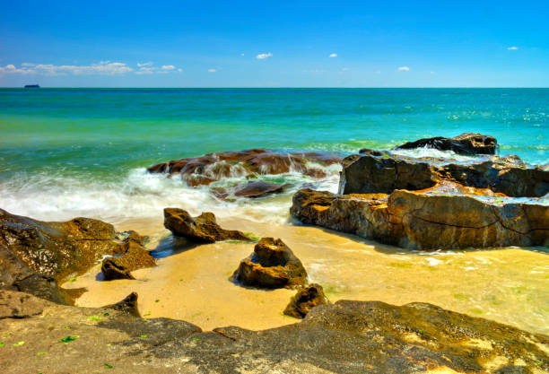 istock Beautiful landscape with rocks and sea waves on a beach 1190437299