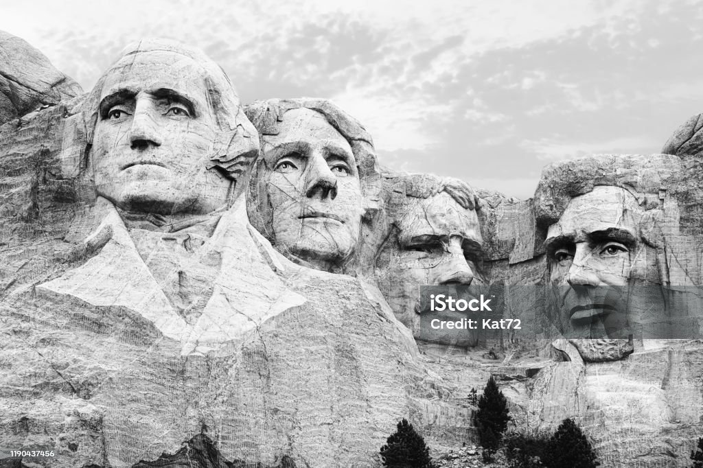 Mount Rushmore in black and white A closeup of the four heads of USA presidents at Mount Rushmore South Dakota in black and white Mt Rushmore National Monument Stock Photo