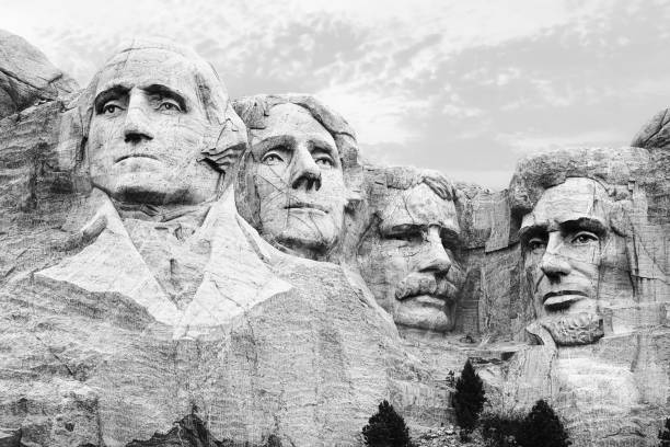 Mount Rushmore in black and white A closeup of the four heads of USA presidents at Mount Rushmore South Dakota in black and white mt rushmore national monument stock pictures, royalty-free photos & images