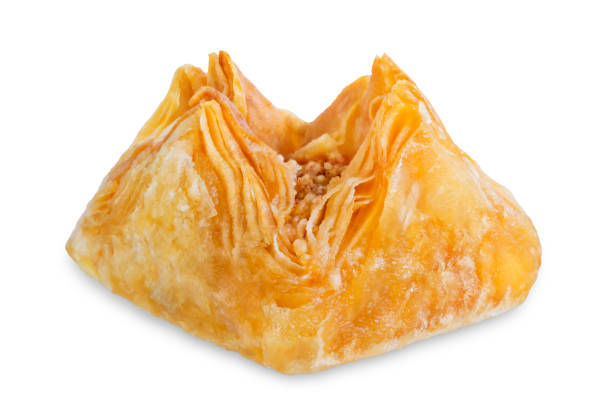 istock Multicolored baklava, Oriental sweetness on a white isolated background 1190437703