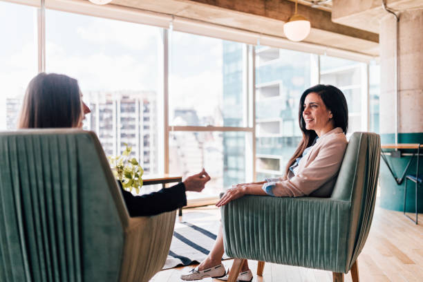 istock Two businesswomen having a meeting 1190439444