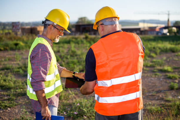istock Engineers,oil workers at industrial facility 1190443648
