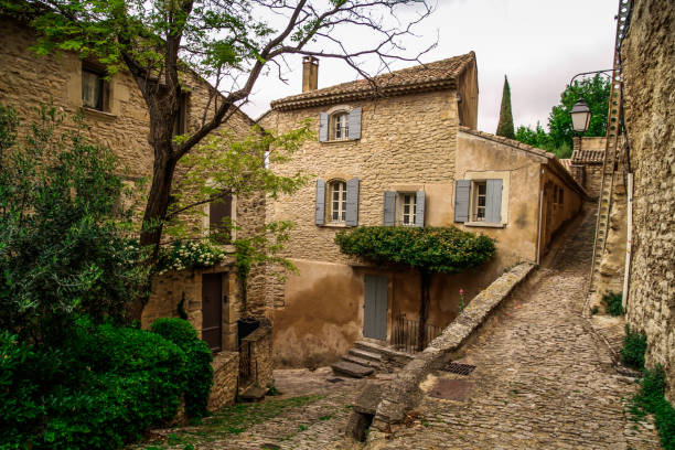 Beautiful panoramic view on medieval town Gordes. Old street of Gordes, a small typical town in Provence, France. Beautiful village, with view on roof and landscape