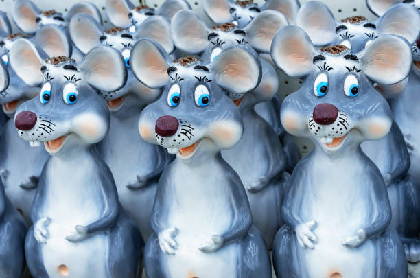 Ceramic figurines of gray mouses. Symbol of 2020.