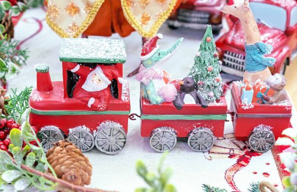istock Christmas toy train with Santa Claus and various animals. 1190446084