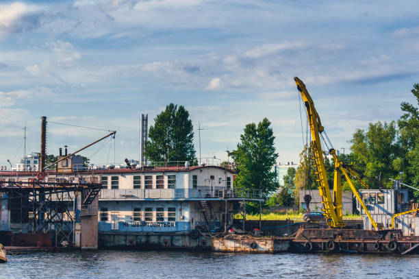 istock Floating repair station and cranes for river vessels 1190452955