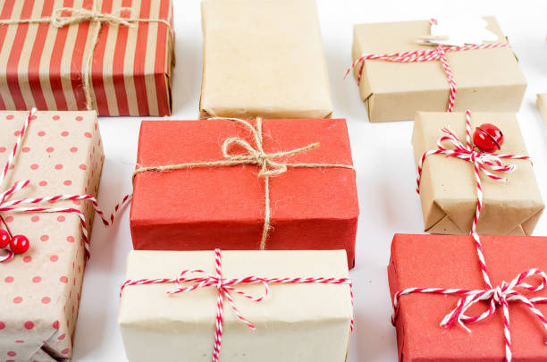 istock Christmas set with many gifts boxes in Wrapping craft Paper on white background. Copy space, Greeting card flat lay, Template mockup greeting card text design 1190453484