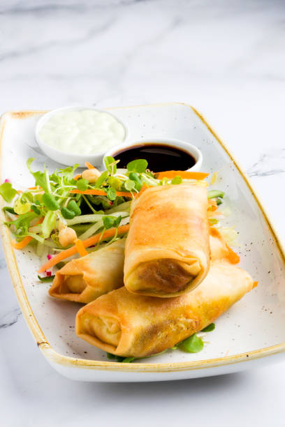 Springrolls with soy sauce - fotografia de stock