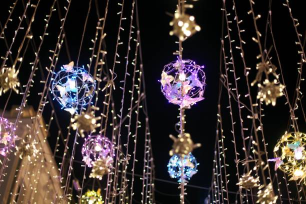 istock Christmas decorations on Manezhnaya Square overlooking the Moscow Kremlin. Preparations for Christmas and New Year celebrations. Night shots. 1190455363