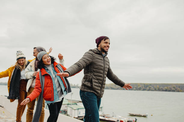 istock Group of friends enjoying in nature 1190457345