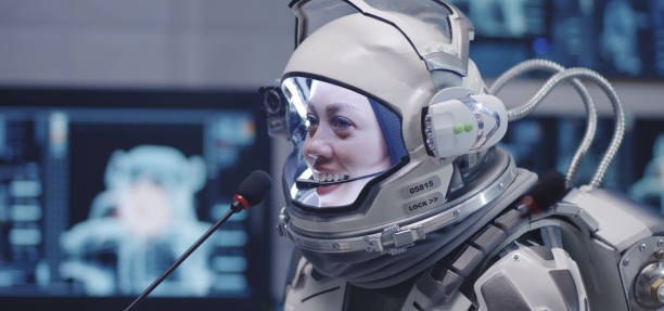 Close-up of a female astronaut talking at a press conference