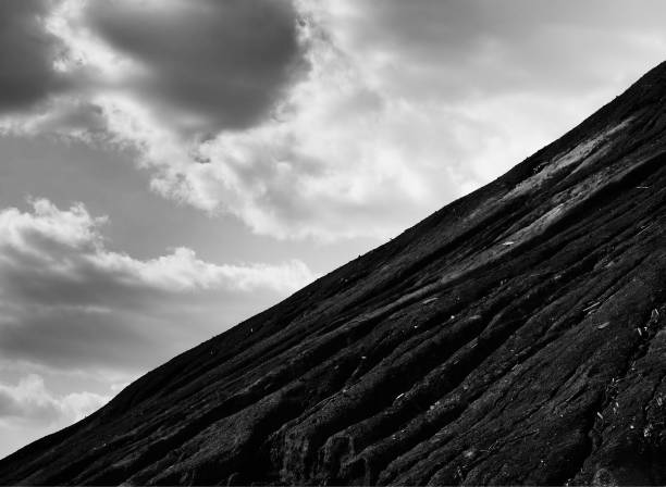 istock Dramatic black and white mountain slope landscape background 1190458756