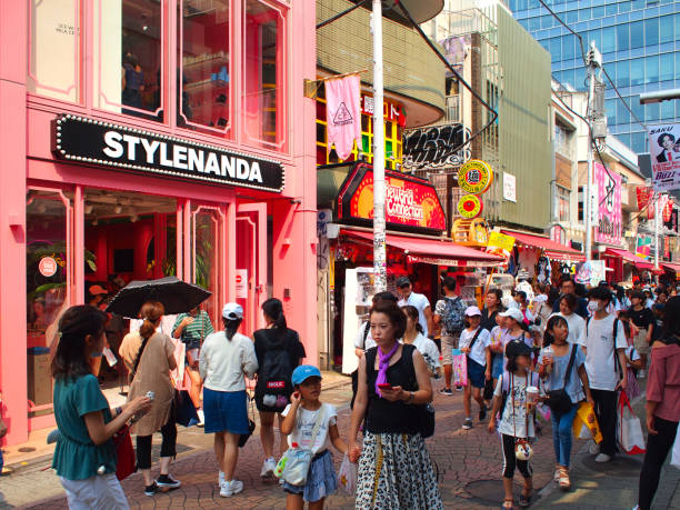Harajuku Tokyo Japan - Takeshita-dori main street famous for unique street fashion and youth culture Harajuku, Tokyo, Japan - August 2nd, 2019: Takeshita street, the main street in Harajuku, filled with people. Harajuku is known internationally as the center of Japanese youth culture and fashion. tokyo harajuku stock pictures, royalty-free photos & images