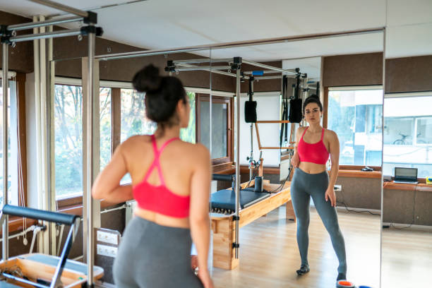 istock A beautiful athlete posing in front of the reformer machine 1190459852