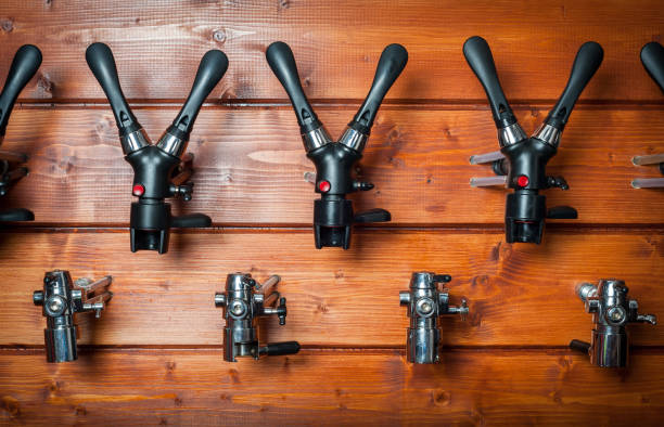 istock Beer taps for draught drinks are built into wooden boards 1190460890